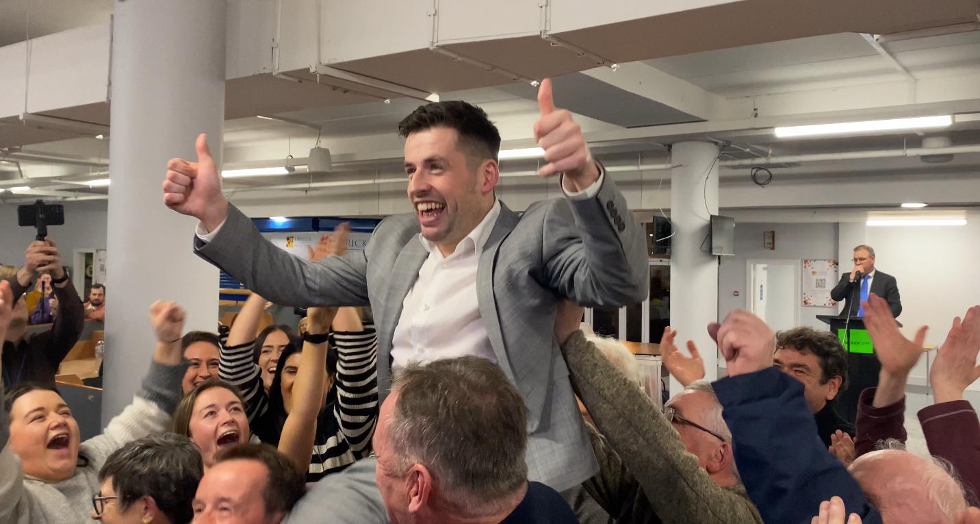 Limerick politician Conor Sheehan being lifted by supporters after successfully being elected as a TD