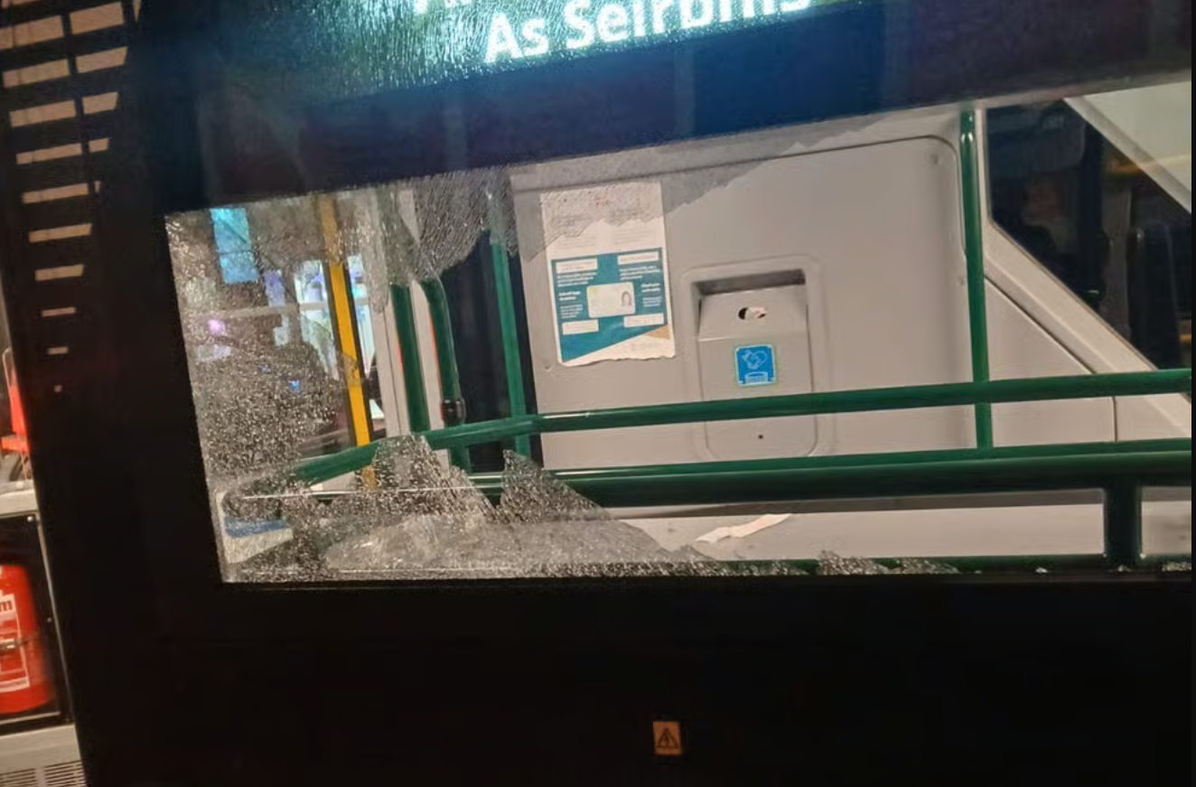 broken window of bus operating on 303 line_Anna Kissane broken window of bus operating on 303